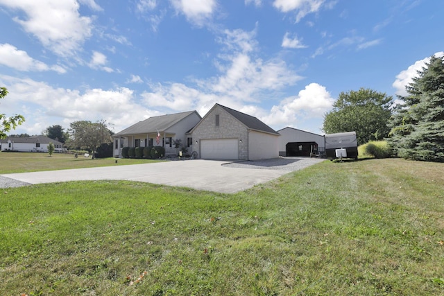 view of front of house with a front lawn and a garage