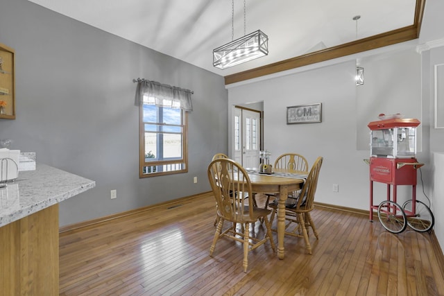 dining room with light wood-type flooring