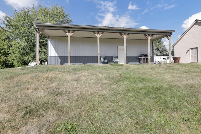 garage with a lawn