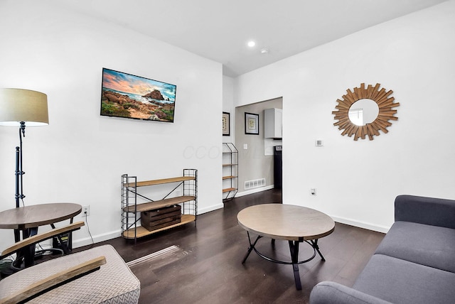 living room featuring dark hardwood / wood-style floors