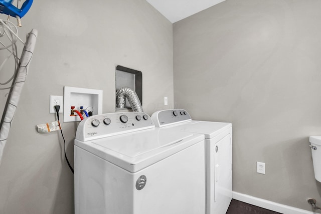 washroom featuring washer and dryer