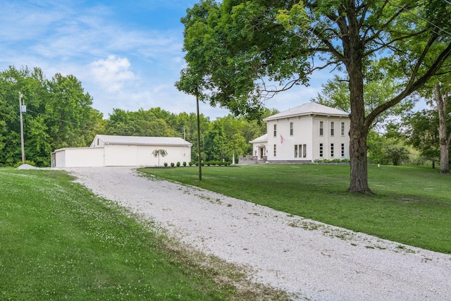 view of front of home with a front lawn