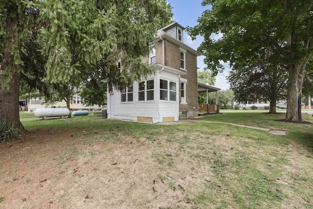 view of home's exterior featuring a lawn