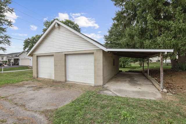 garage with a lawn