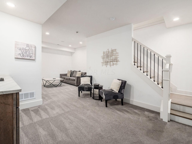 living room featuring light colored carpet