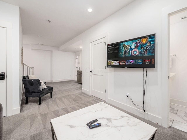 living room featuring light colored carpet