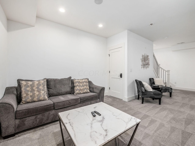 living room featuring light carpet