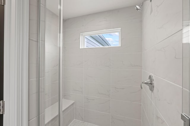 bathroom featuring walk in shower