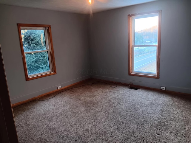 view of carpeted spare room