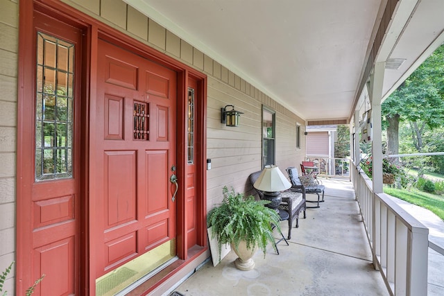 property entrance featuring covered porch