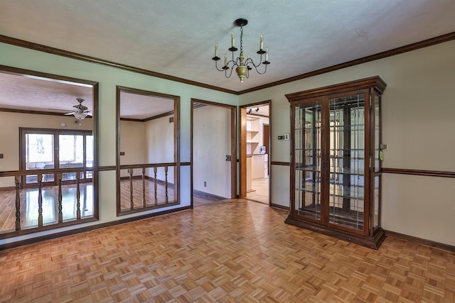 empty room with ceiling fan with notable chandelier, a textured ceiling, light parquet flooring, and crown molding