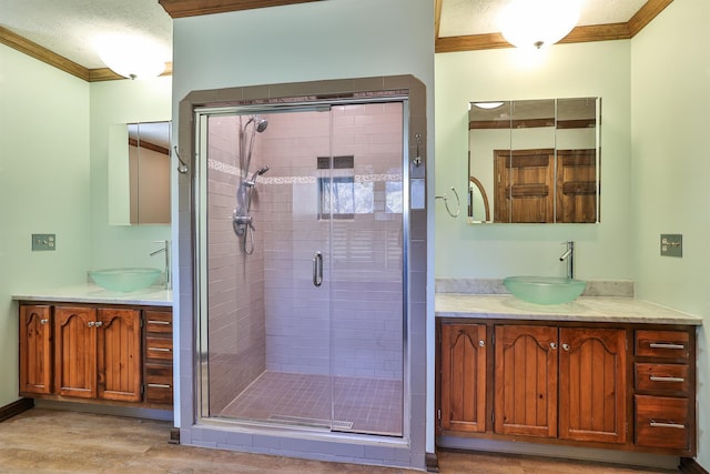 bathroom with wood-type flooring, vanity, a shower with door, and crown molding