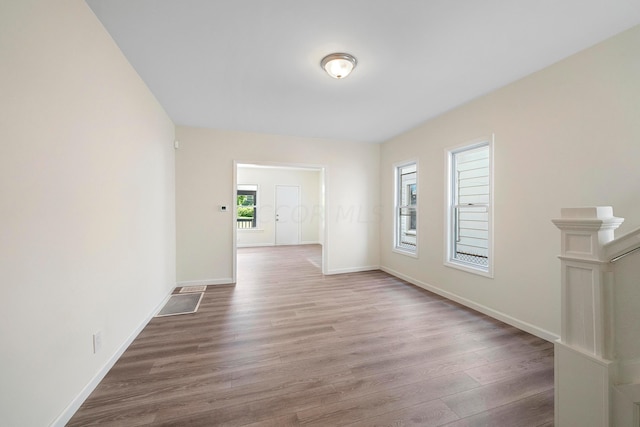 empty room featuring hardwood / wood-style floors