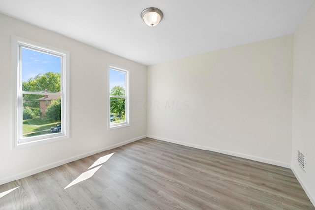 empty room featuring light hardwood / wood-style floors