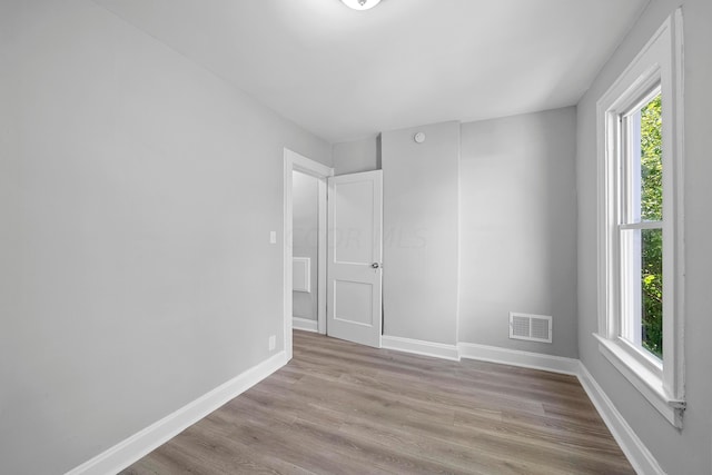 empty room featuring light hardwood / wood-style floors