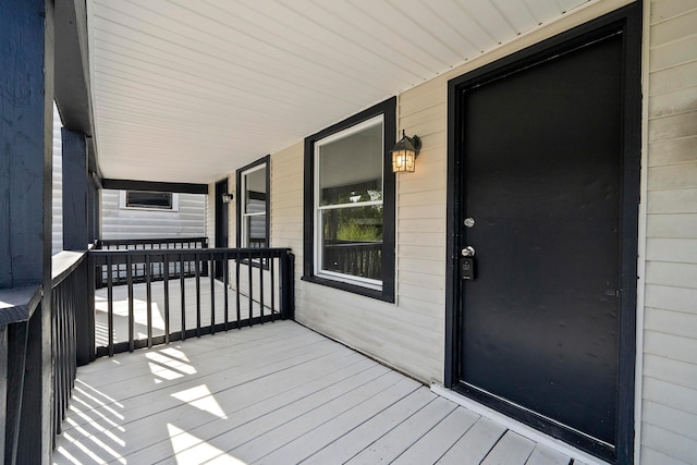 wooden deck with a porch