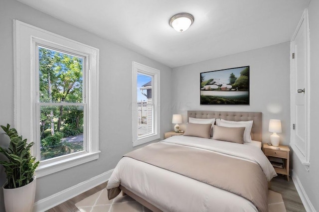 bedroom featuring hardwood / wood-style floors