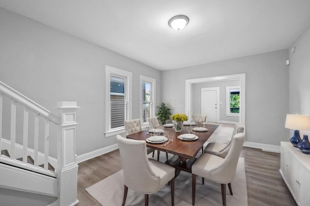 dining room featuring dark hardwood / wood-style flooring