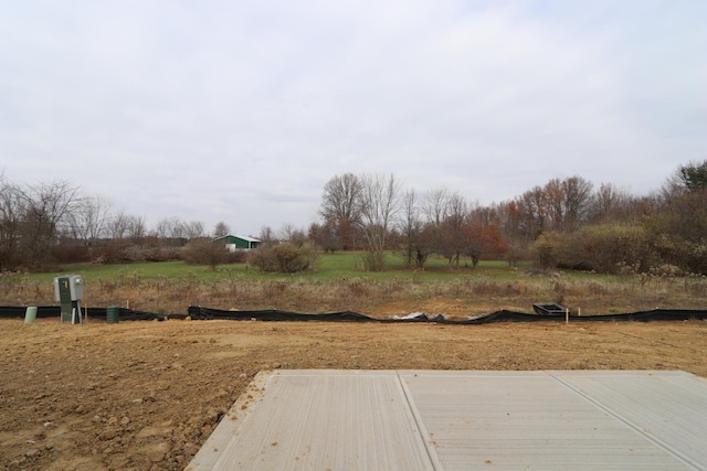 view of yard with a wooden deck