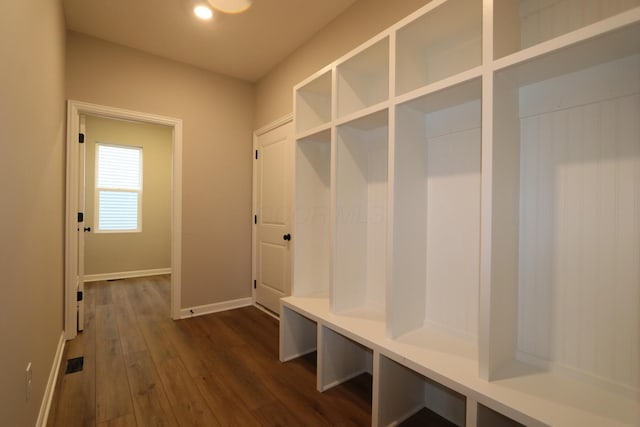 mudroom with dark hardwood / wood-style floors