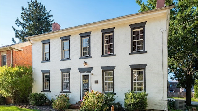 view of front of house featuring central air condition unit