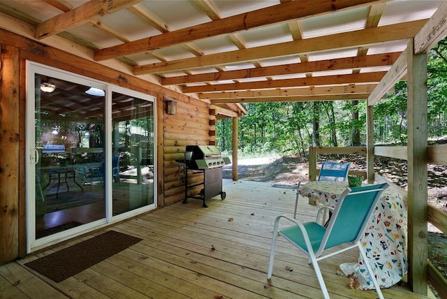 wooden deck with grilling area