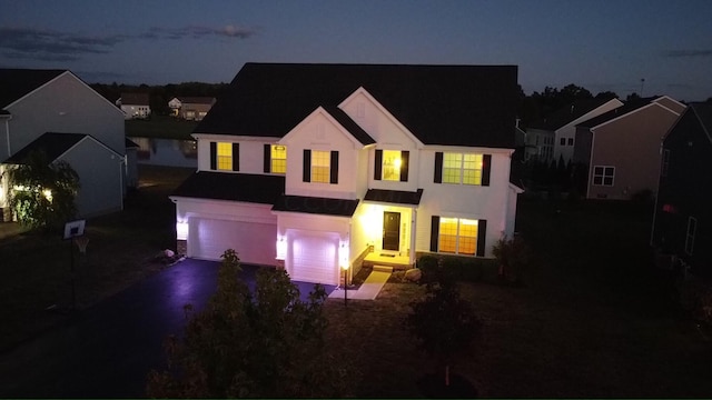 view of front of property featuring a garage