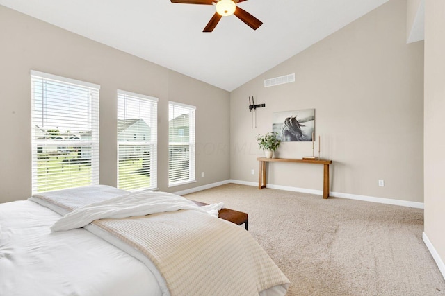 bedroom featuring ceiling fan, light colored carpet, and lofted ceiling