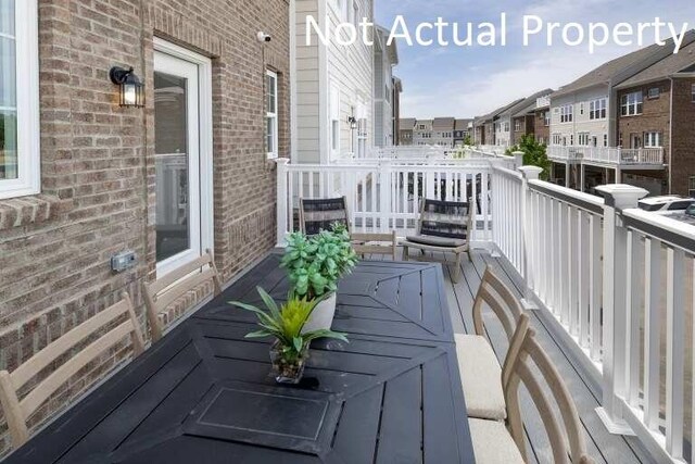 balcony featuring a residential view