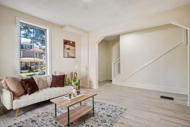 living room with light hardwood / wood-style flooring