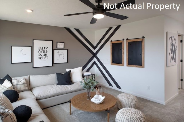 living room with carpet floors and ceiling fan