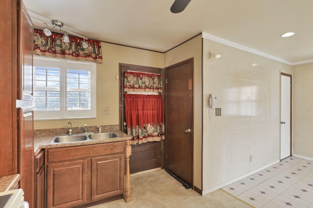 bathroom with vanity and crown molding