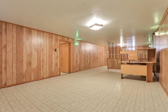 interior space featuring wooden walls