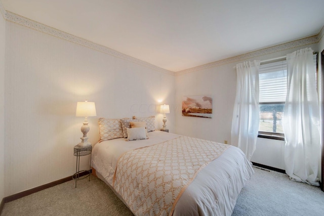 bedroom featuring light colored carpet