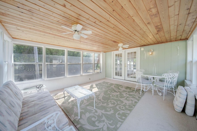 sunroom / solarium with ceiling fan and wooden ceiling