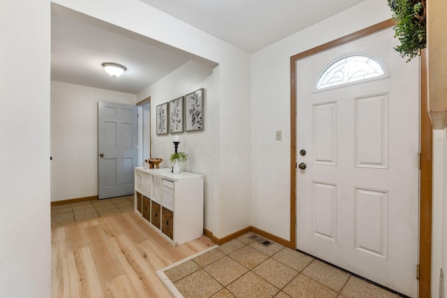 foyer entrance featuring light hardwood / wood-style flooring