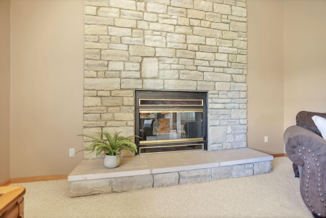 details with a fireplace and carpet