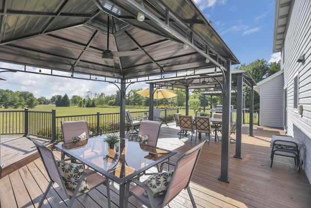 wooden deck featuring a gazebo