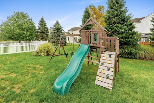 view of jungle gym featuring a yard