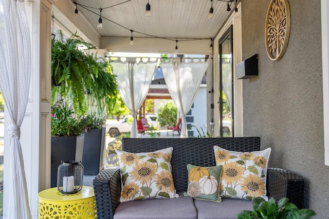 sunroom / solarium featuring wooden ceiling