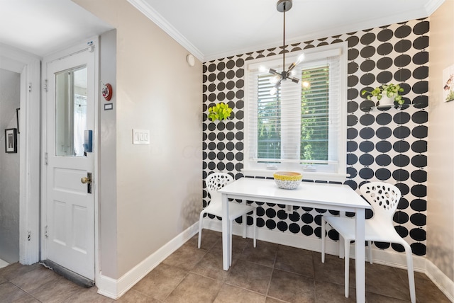 tiled dining area featuring breakfast area, an inviting chandelier, and crown molding