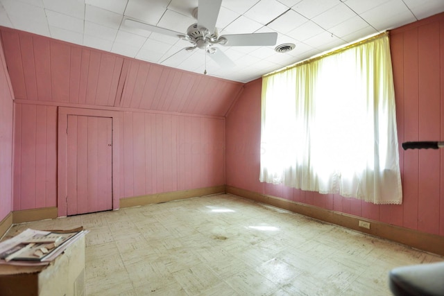 bonus room with vaulted ceiling and ceiling fan