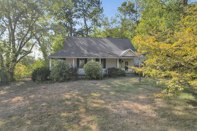 view of front of house featuring a porch and a front yard