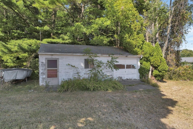 garage with a lawn