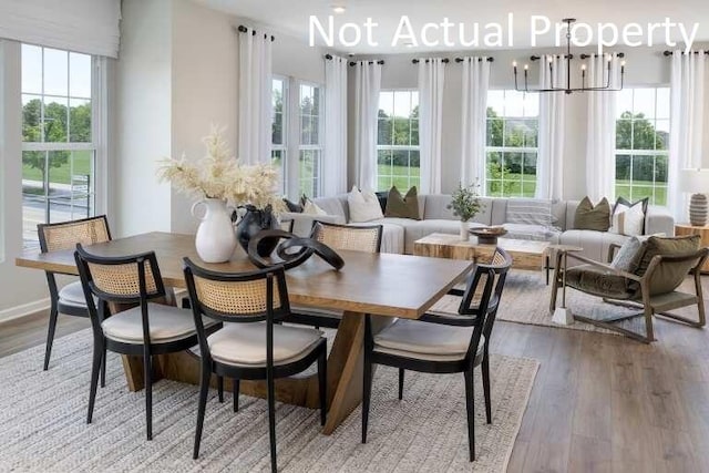 sunroom with a notable chandelier