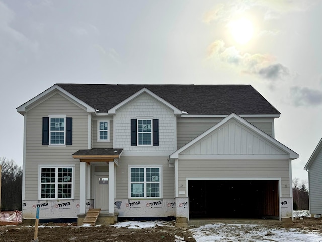 view of front of property with a garage