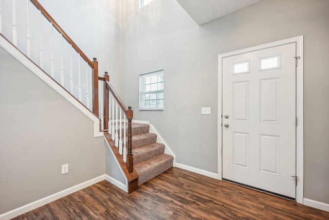 foyer featuring dark hardwood / wood-style flooring