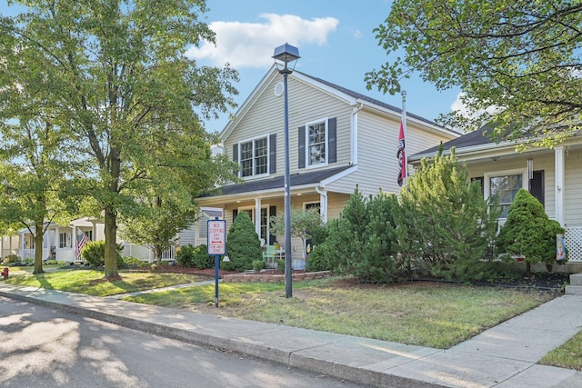 view of front of home with a front lawn