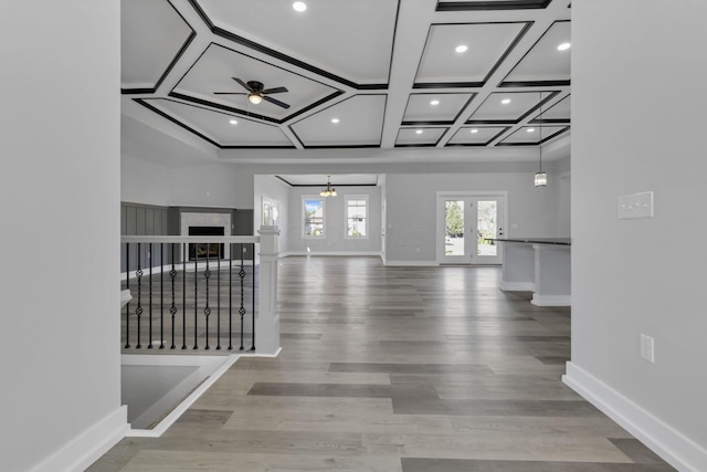 13917 Fantasy Way, Pickerington, OH 43147 - hallway with a chandelier, french doors, hardwood / wood-style flooring, and coffered ceiling