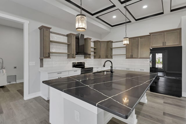 13917 Fantasy Way, Pickerington, OH 43147 - kitchen with light wood-type flooring, sink, electric stove, wall chimney range hood, and a large island